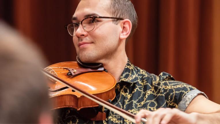 Student playing violin