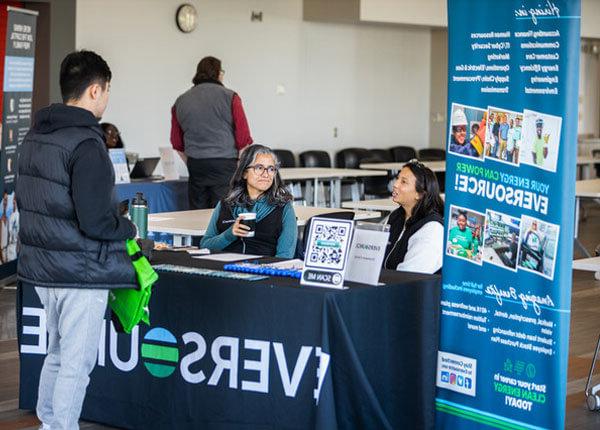 Student talking to employer at Career Fair